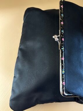 Vintage black clutch with floral painted trim